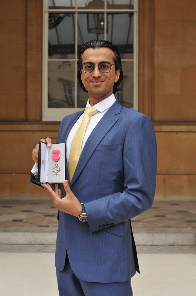 Vikas Shah receiving his MBE for Services to Business and the Economy